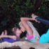 Karissa Becker and her little om doing yoga